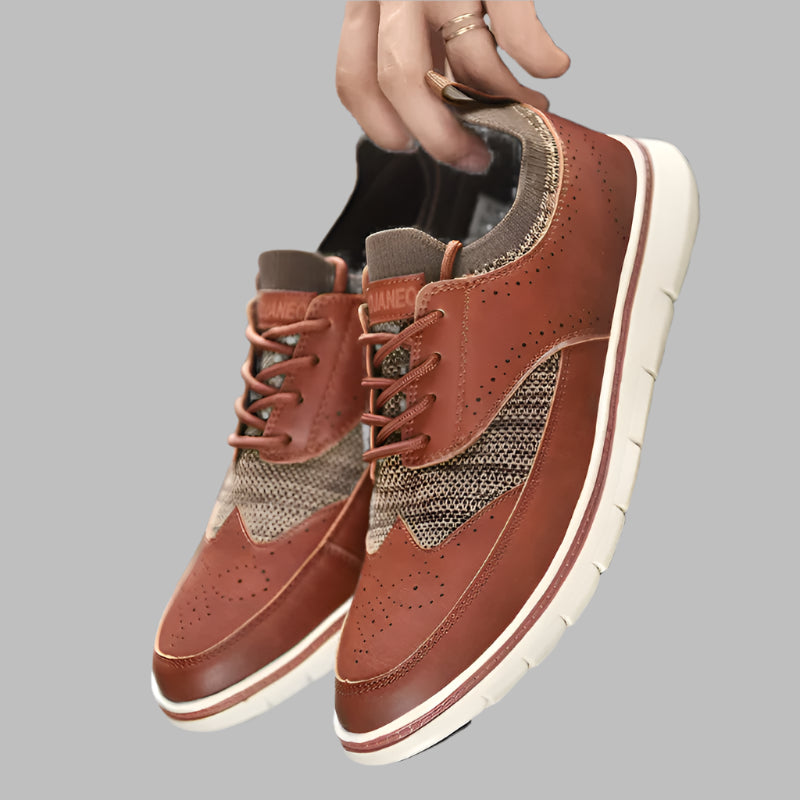 brown-formal-trainers-in-hand